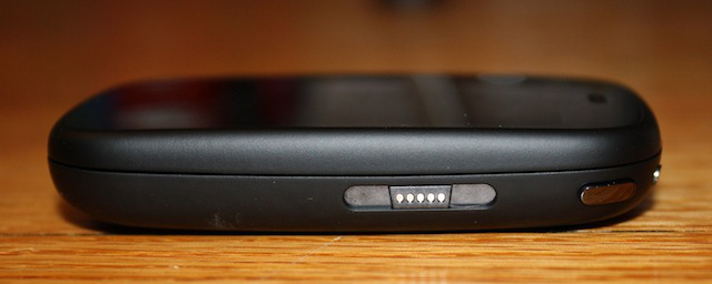 The veer's magnetic charging port/headphone jack port is on the right side.