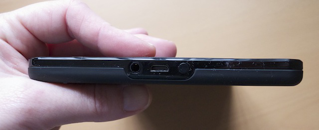 The bottom of the Kindle Fire, with power button, headphone jack, and microUSB port
