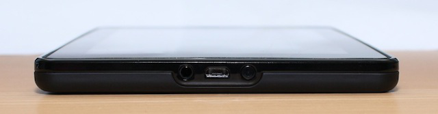 The bottom of the Kindle Fire with headphone jack, microUSB port, and power button.
