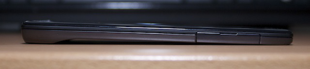 One side of the Droid Razr has a trapdoor that goes nowhere exciting, unless you find SIMs and microSD cards exciting.