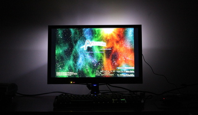 This is how the screen looks with a game playing. The ambient light increases relative contrast on the screen, making colors appear brighter and blacks deeper