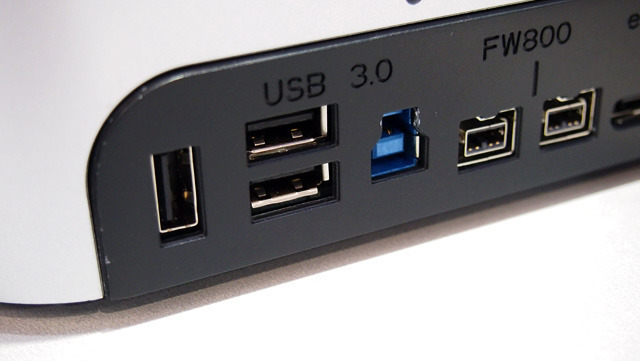 This vertical USB 3.0 port (left) can output up to 2A (or 10W total) to charge high-power devices like the iPad.