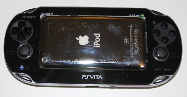 An entire iPod Touch can't quite cover the viewable screen area on the PlayStation Vita