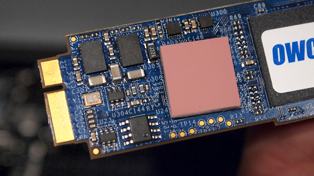 The Aura Pro Express's Sandforce controller is covered by a large thermal pad.