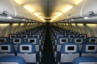 Will iPod-compatible in-flight entertainment be enough to entice travelers to cough up the dough for rising ticket prices?