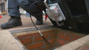 One of the Virgin Media "smart pavement" manhole covers in Chesham.