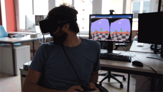 An animated GIF of me, doing a sweet 180-degree spin while playing <em>Super Mario Bros</em>.