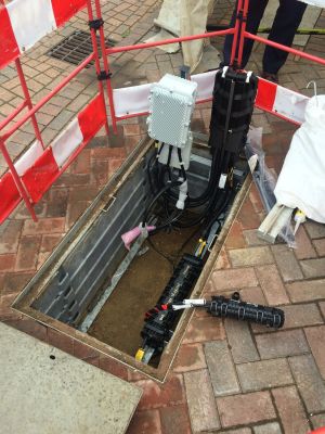 The white-grey box is an under-pavement DSLAM from a UK G.fast trial.