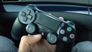 The possibly redesigned Dual Shock 4 controller, with a transparent strip across the top.
