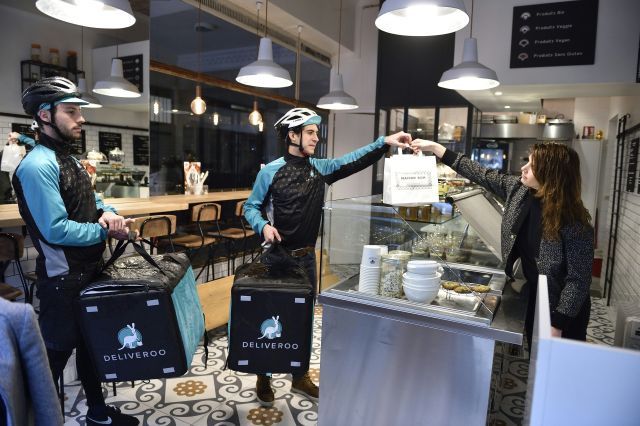 Bikers working for food delivery service Deliveroo 