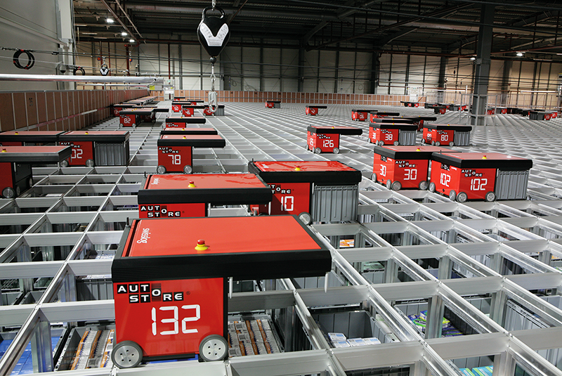 Swisslog AutoStore grid-based bin selection system installed at an Asda warehouse. 