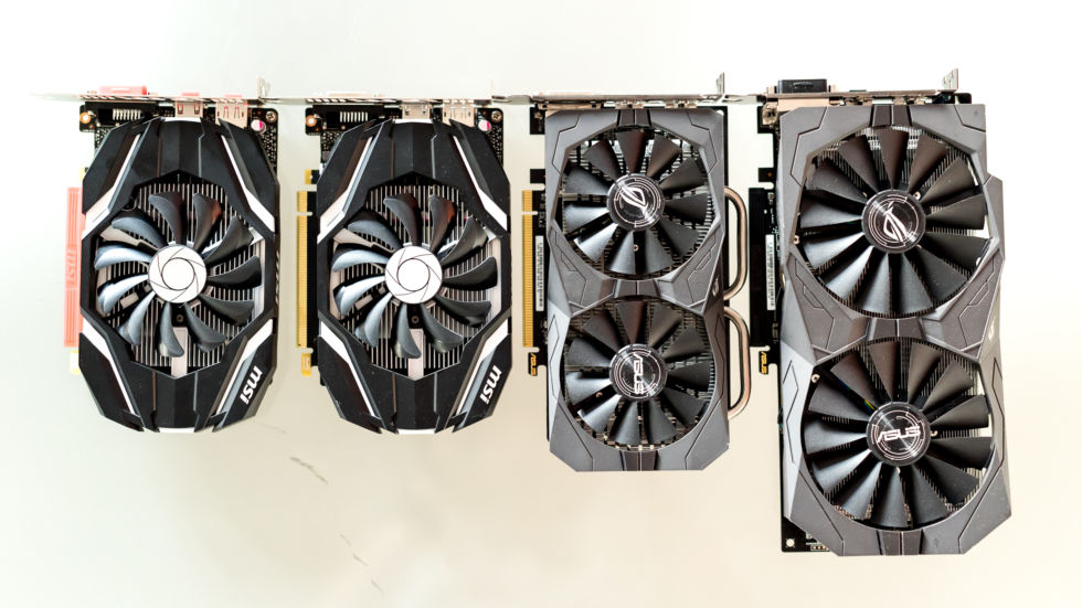 MSI's GTX 1050 and 1050 Ti on the left, and Asus' RX 460 and RX 470 on the right.