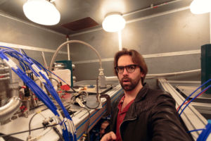 Me, young and amazed next to a dilution cooling unit.