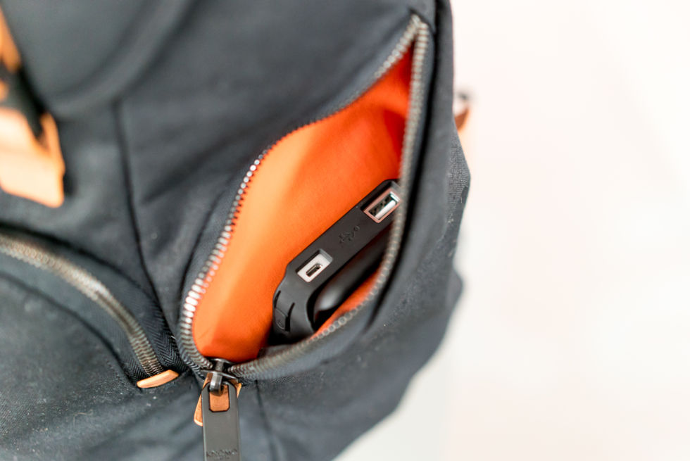 "Wireless charging" consists of a standalone QI battery pack stuffed into the side pocket.