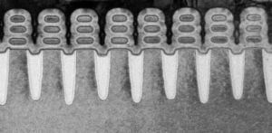 A side view of the completed gate-all-round transistors.  Each transistor consists of three nanosheets stacked on top of each other, with the gate material surrounding them.